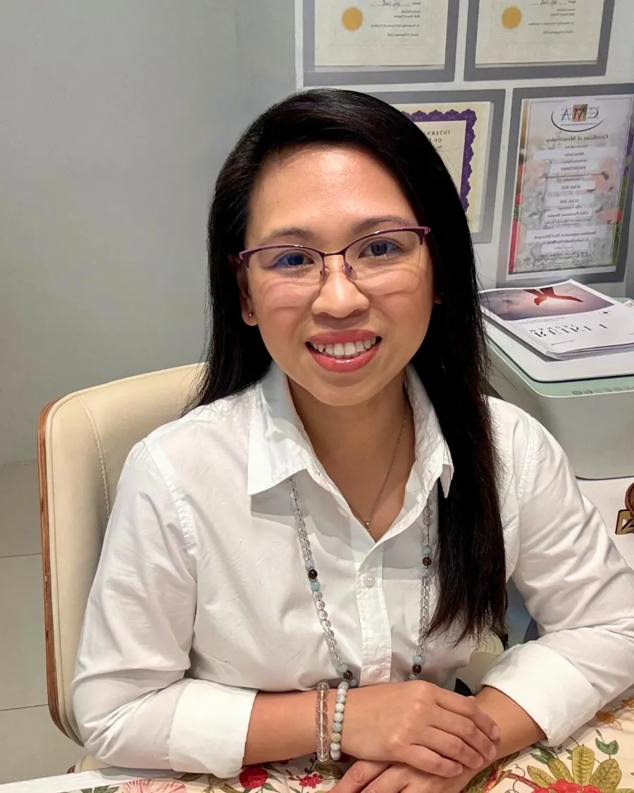 Aileen Javier, founder of Sphaera Lucis, seated in the Makati studio